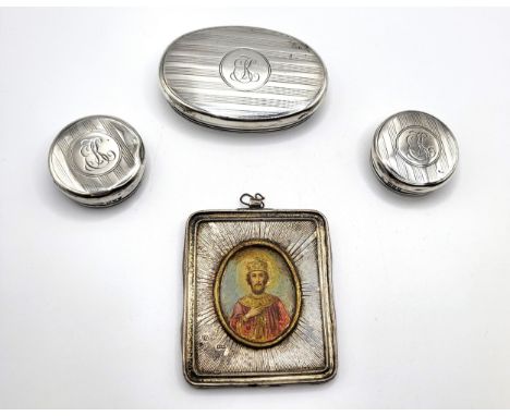 A miniature silver frame with a hand painted oval  portrait of a king in a starburst surround with Russian silver hallmarks a