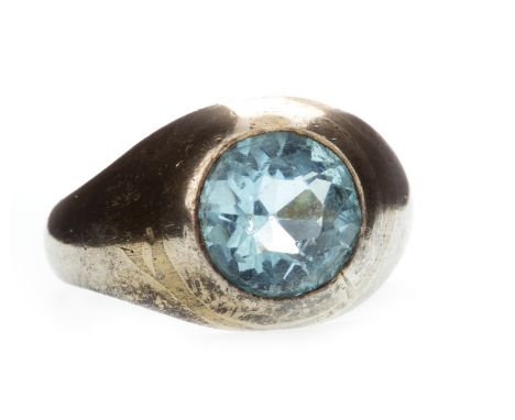 GEM SET RING with a countersunk faceted blue stone 9mm diameter, the tapered shank marked 14, size R, 7.5g