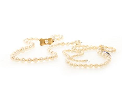 PEARL NECKLACE, formed by a single strand of pearls, 40cm long, with a pearl set clasp with foreign marks; along with another