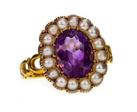 LATE VICTORIAN AMETHYST AND PEARL CLUSTER RING, set with a central oval faceted amethyst 9.6mm long and surrounded by split p