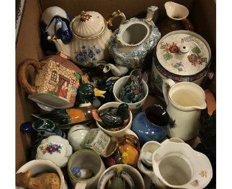 Three boxes of assorted china wares to include hand-painted terracotta plates, etc, a box of assorted glassware, a box of sun