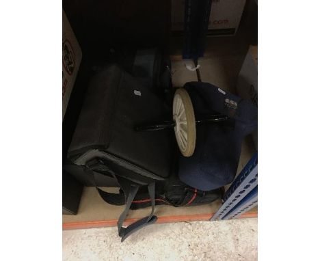 Two wooden bound trunks, together with various suitcases, camera cases, etc, an exercise wheel and a box of books relating to