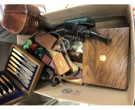 A box containing a leather collar box with horsehoe decoration to top containing various collars, a kukri, blow lamp, trunche