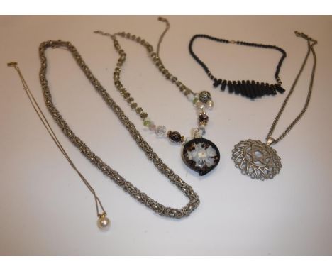 Six various necklaces to include silver mounted pierced ball and opal necklace, a 9 carat gold chain link necklace with singl