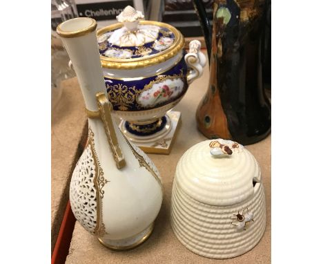 A Royal Worcester bleu royale gilt and floral decorated pedestal sucrier and cover (cover damaged and restored), date marked 