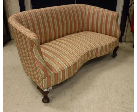 An early 20th Century upholstered scroll arm salon sofa with shaped front rail raised on squat cabriole legs to pad feet and 