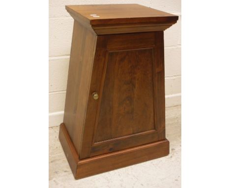 A modern mahogany urn stand or pot cupboard of tapering form with single door enclosing single shelf, raised on a plinth base