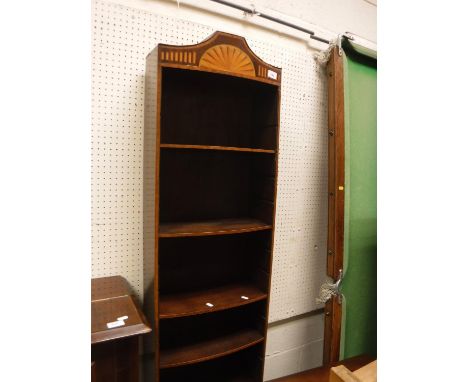 An Edwardian Sheraton Revival bookcase cabinet of slim proportions, the fan marquetry inlaid caddy top over a bow front with 