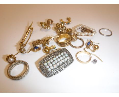 A collection of various jewellery to include un-marked yellow metal rings x 3, seed pearl and red stone crescent brooch, marc