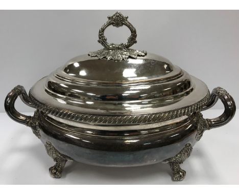 An Old Sheffield Plate oval tureen and cover bearing lozenge stamp with crossed arrows (for William Hutton &amp; Sons), 41 cm