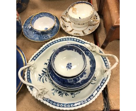 A collection of 18th and early 19th Century Worcester and Worcester type blue and white pottery including a hop decorated dis