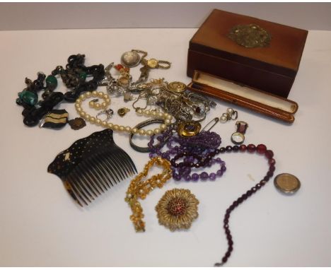 A box containing a collection of various costume jewellery including various bracelets, diamante simulated pearl necklace, br