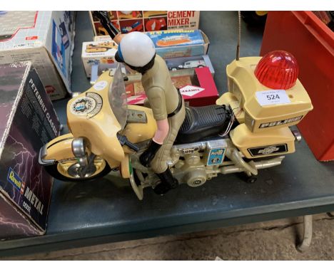 A VINTAGE 1984 SON-AI HIGHWAY PATROL MOTORCYCLE AND RIDER 
