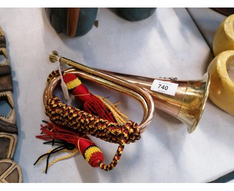A SMALL COPPER MILITARY BUGLE 