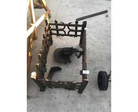 A VINTAGE ORNATE FIRE GRATE, GRINDSTONE WHEEL AND A SHOE LAST 