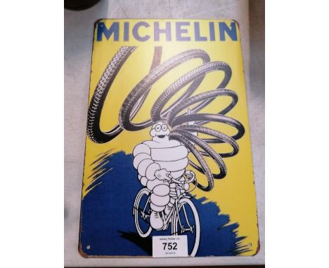 A VINTAGE STYLE 'MICHELIN MAN' METAL SIGN 