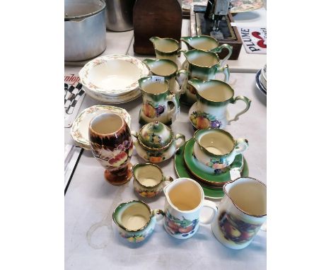 A COLLECTION OF CERAMIC TEA SET WITH FRUIT DESIGN AND FURTHER PLATES ETC 