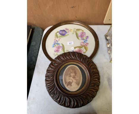 TWO ROUND FRAMED ITEMS - EMBROIDERED TRAY AND PORTRAIT 