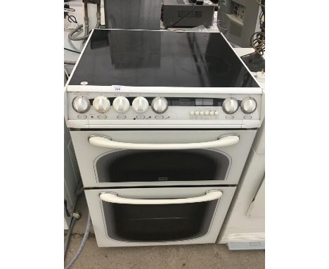 A CONCEPT DOUBLE OVEN WITH GRILL AND A CERAMIC HOB (DIRECT WIRED) 