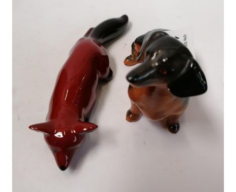 TWO CERAMIC FIGURES - BESWICK DOG AND ROYAL DOULTON FLAMBE FOX LYING DOWN 