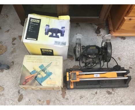 A MCKELLAR BENCH GRINDER, A JOINT MASTER SAW AND A CONTRACTOR TILE CUPBOARD ETC IN WORKING ORDER 