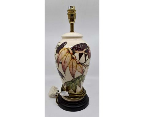 A Moorcroft Sumach Tree table lamp designed by Philip Gibson, date 2004, 40cm high including fittings and plinth (not tested)