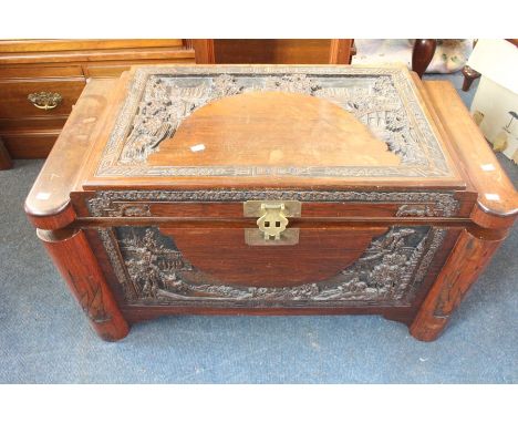 ***LOCATED AT GRESLEY****A Chinese hardwood camphor chest with single internal shelf, early 20th Century, inverted hand grips