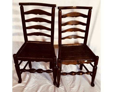 ***ITEM LOCATION BISHTON HALL*** A pair of 18th century oak and elm ladder back Macclesfield chairs, raised on straight cabri