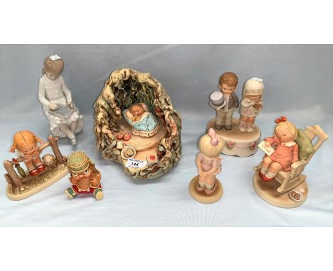 A group of 4 Mabel Lucie Atwell figures including 'Here Comes the Bride' (restored and another a.f) with musical movement; a 