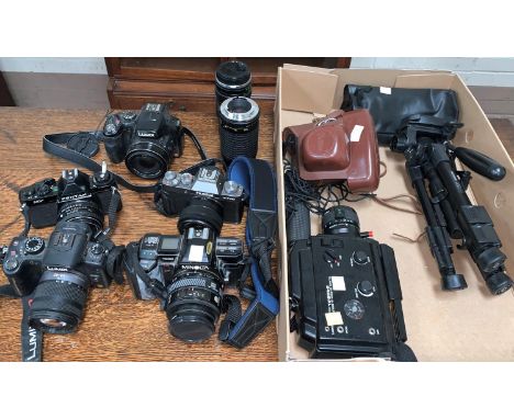 2 SLR cameras - Minolta and Pentax; other cameras and lenses 