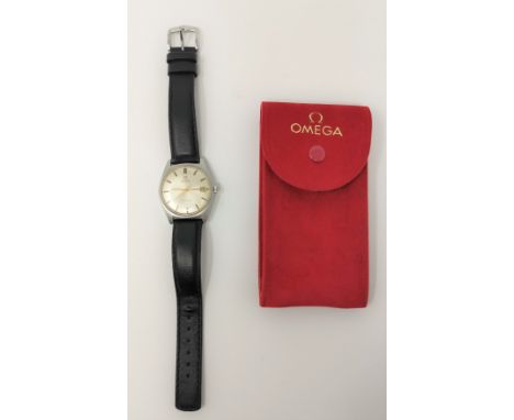 A gent's Omega Genève automatic wristwatch with sweep second hand and date aperture, gilt hands and batons, brushed steel cas
