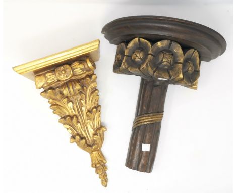 A carved giltwood wall bracket, 35 cm; another; a similar wall shelf 