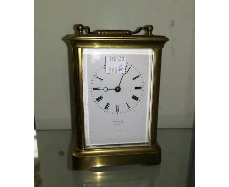 A 19th century brass carriage clock with white enamel dial, by Johnson, Preston, 14.5cm 