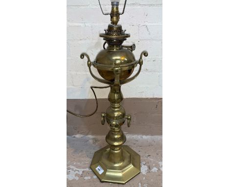 A 19th century Ecclesiastical style brass oil lamp, 61 cm (converted to electric light) 