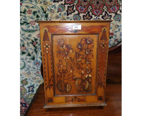 An Edwardian small pine wall cupboard with pokerwork decoration, enclosed by single door, height 49 cm; an oriental small 2 h