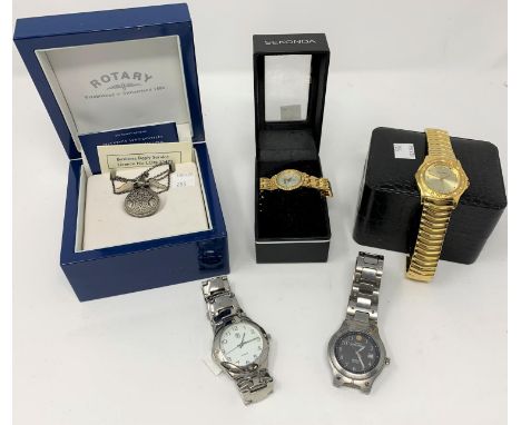 A Timex Expedition wristwatch, 2 similar and a Cosmopolitan pearlescent lady's gilt quartz watch, boxed 