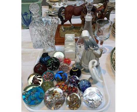 A Lladro group:  girl with geese hand (a.f.); a Lladro goose; a collection of glass paperweights and glassware 