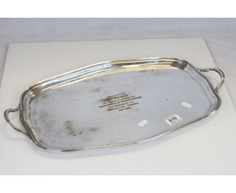 A vintage silver plated two handled tray presented to a Church organist for a life time voluntary services.