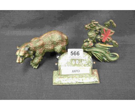 Vintage George and the Dragon leather rack, cast brass figure of a bear, vintage desktop calendar 