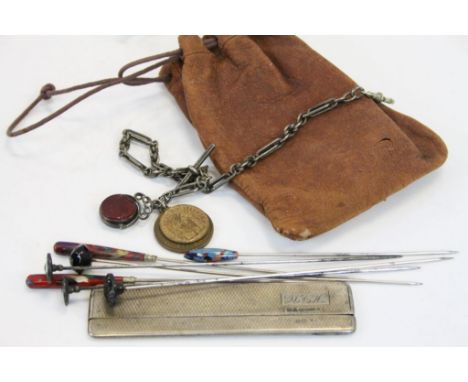 A small collection of items to include a hallmarked silver cased comb, a selection of hat pins and an albert chain with a hal