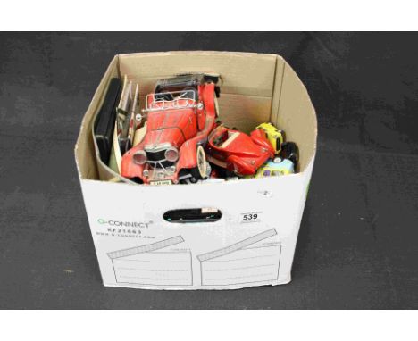 A large quantity of model cars to include tinplate Morgan style car.
