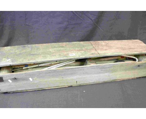 A vintage croquet set in original wooden case.