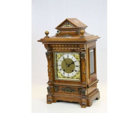 Large vintage Oak cased Bracket Clock, with ornate Gilt &amp; Silvered Dial &amp; applied Brass detailing to case, movement m