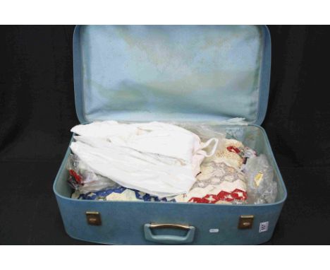 Two suitcases containing vintage and antique clothing to include furs,dresses etc.