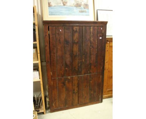 Vintage Stained Pine Kitchen Cupboard, the four doors opening to reveal three shelves, 125cms wide x 185cms high x 50cms deep