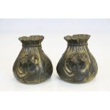 Pair of Edwardian Gilt finish Spelter lucky cash bag Money boxes each with a pair of Dachshunds