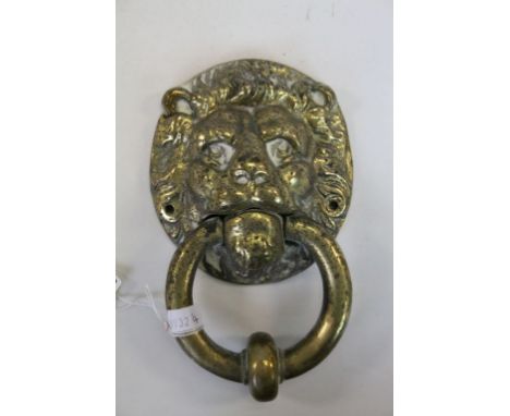 Antique lion mask brass door knocker.