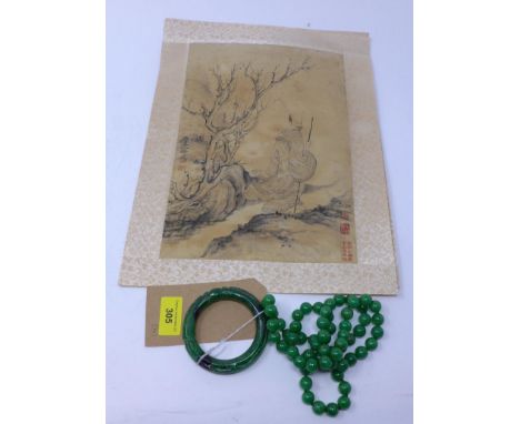 A Chinese carved green jade bangle dia: 8cm with a green jade beaded necklace 84cm and two Chinese prints on silk both signed