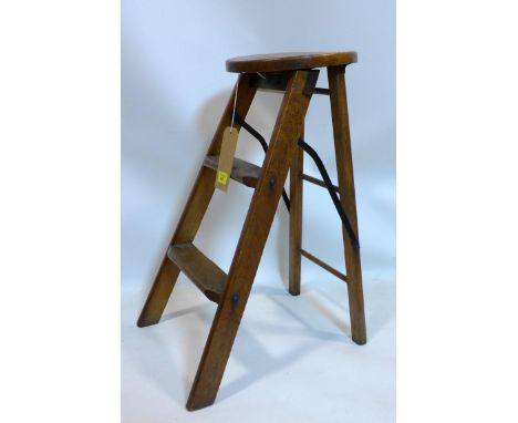 A 20th century oak ladder/stool with makers plaque for Banfield knight &amp; co 
