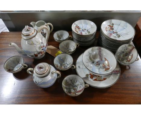 An early 20th century Japanese egg shell porcelain tea service 